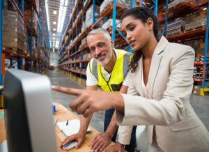 A female authority person going through the inventory list